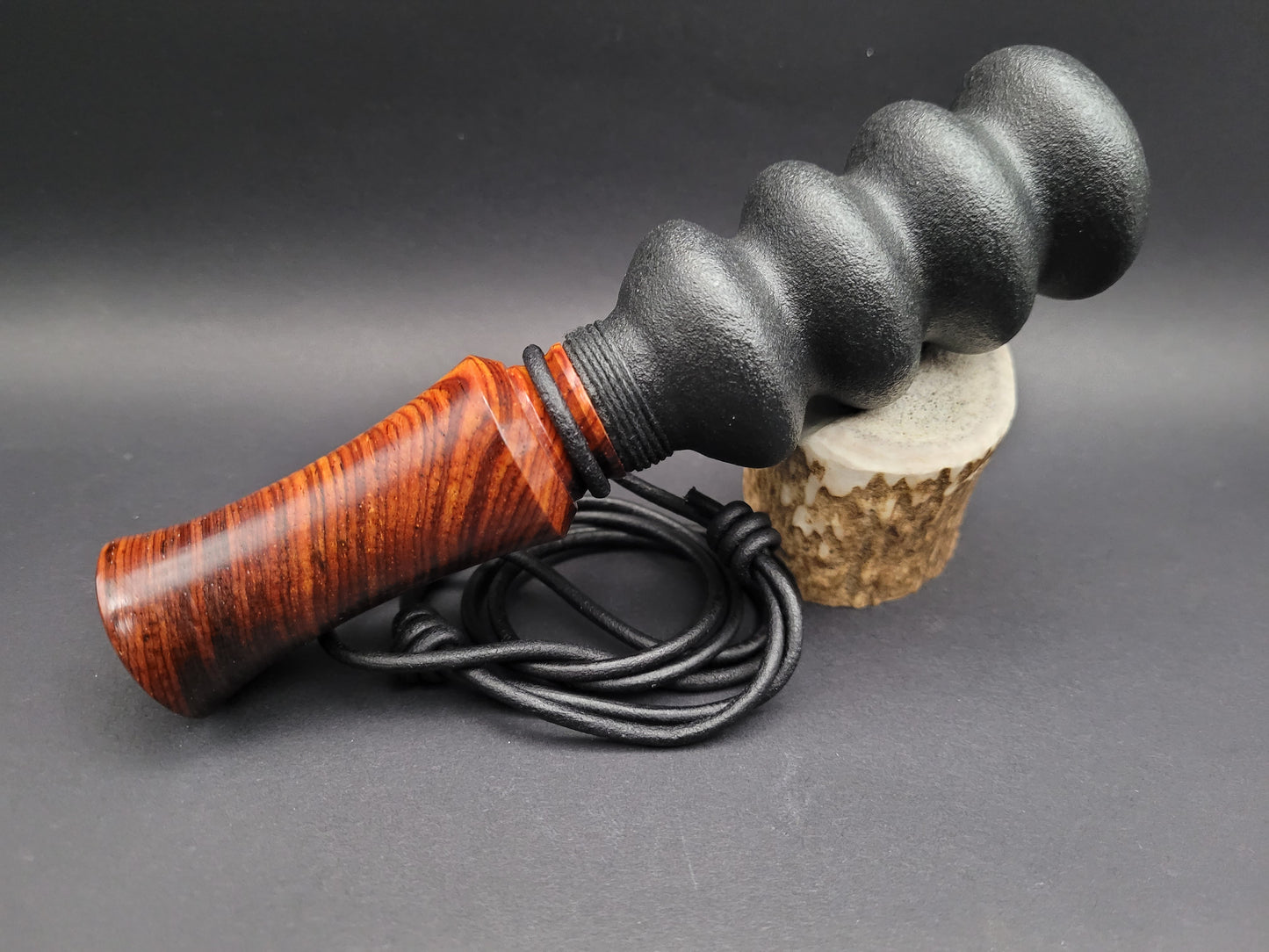 Handcrafted wooden double reed squirrel call in Crosscut Cocobolo