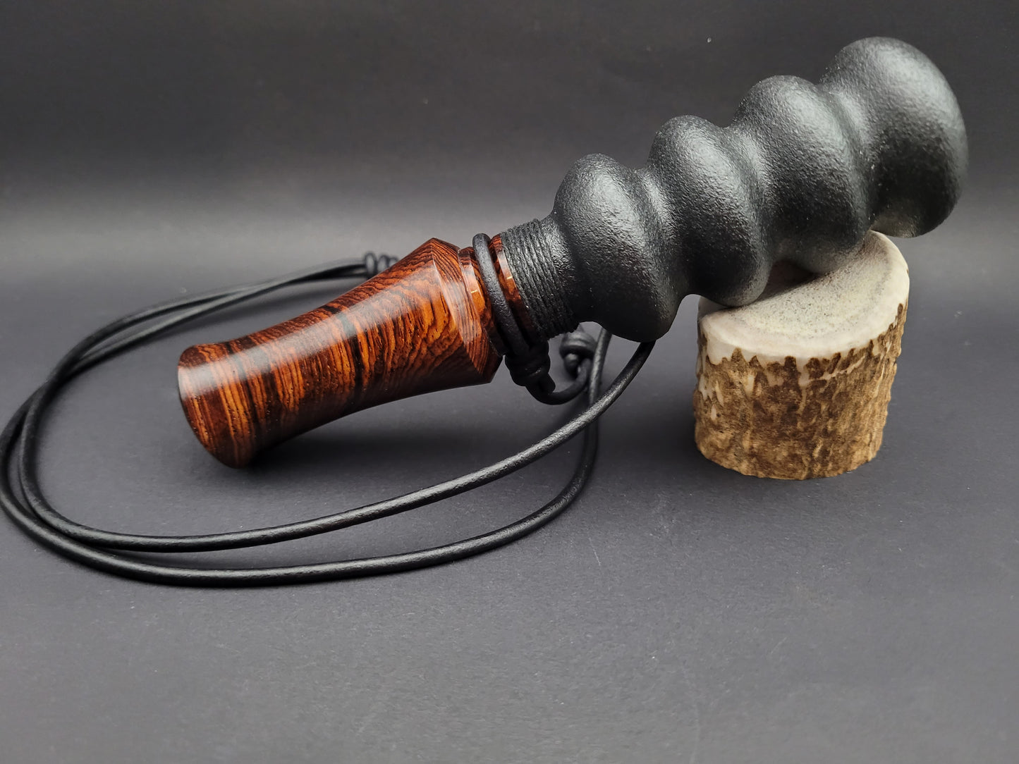 Handcrafted wooden double reed squirrel call in Crosscut Cocobolo